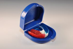 gebitsbeschermer in een blauw doosje